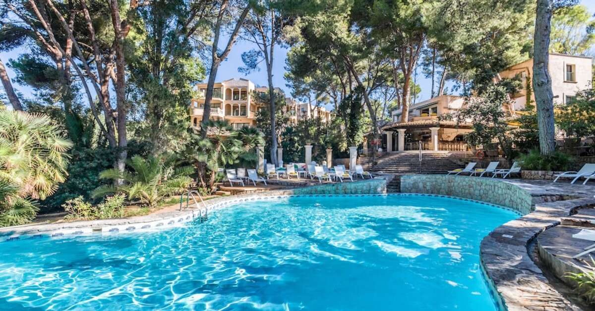 Een foto van het zwembad bij Hotel Lago Garden Suites & Spa