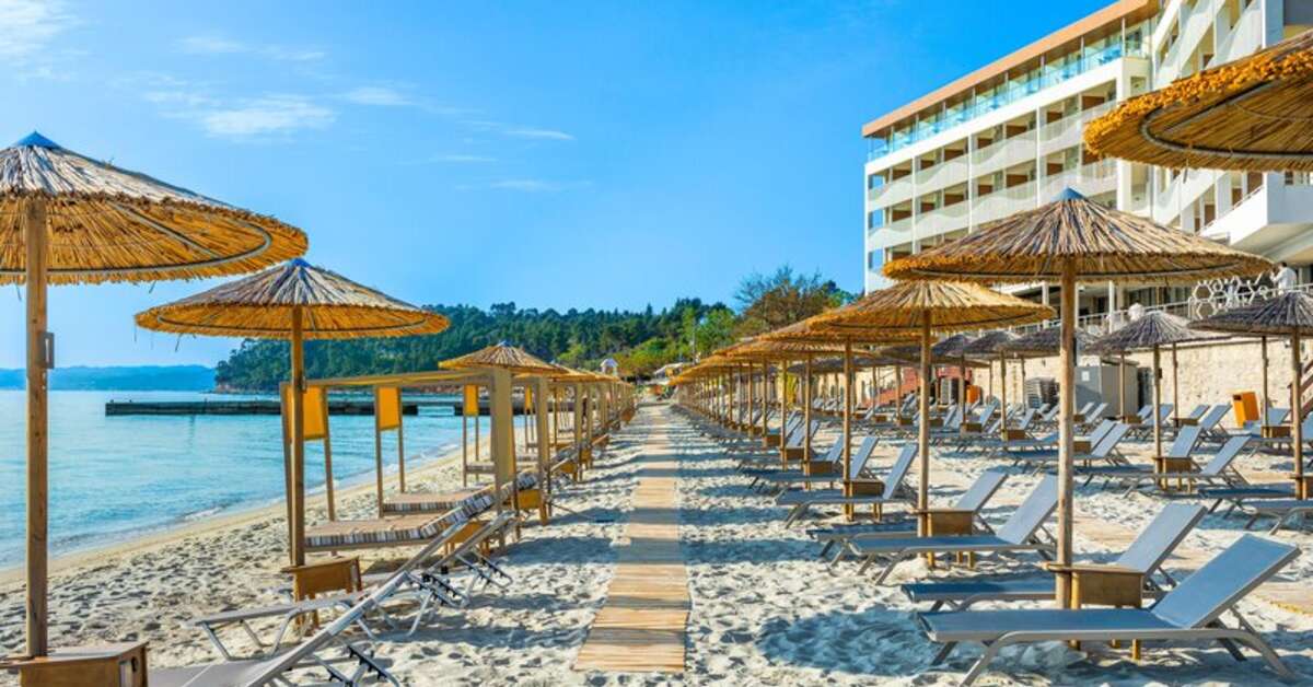 Een foto van het strand bij Ammon Zeus Hotel