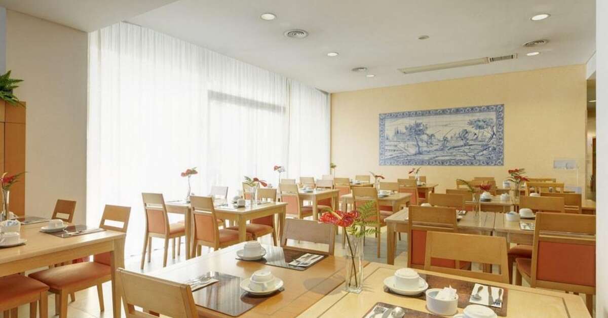 Een foto van de faciliteiten bij Tryp by Wyndham Porto Centro Hotel