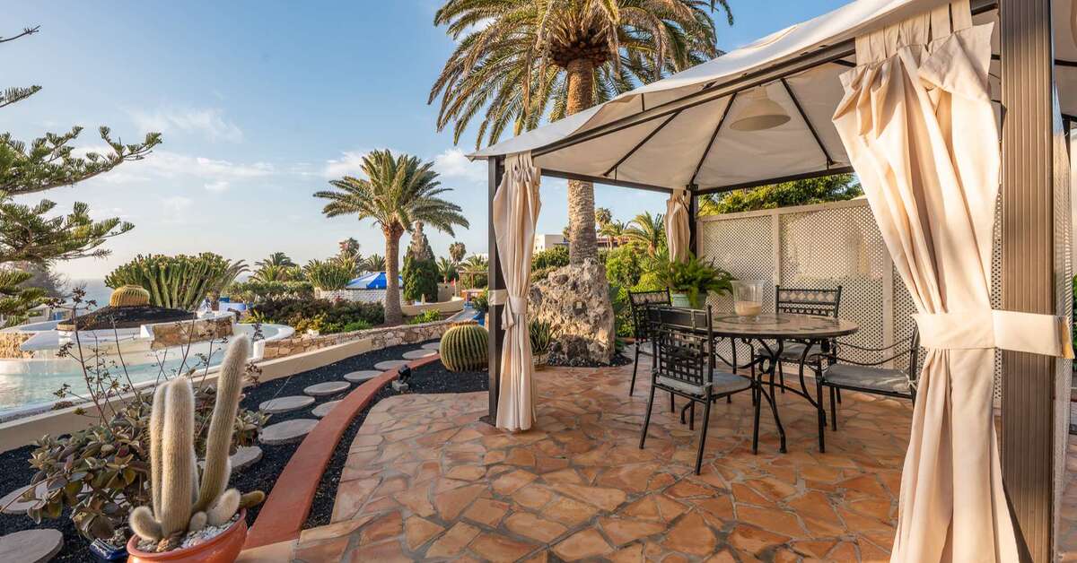 Een foto van het terras bij Hotel Livvo Risco del Gato Suites