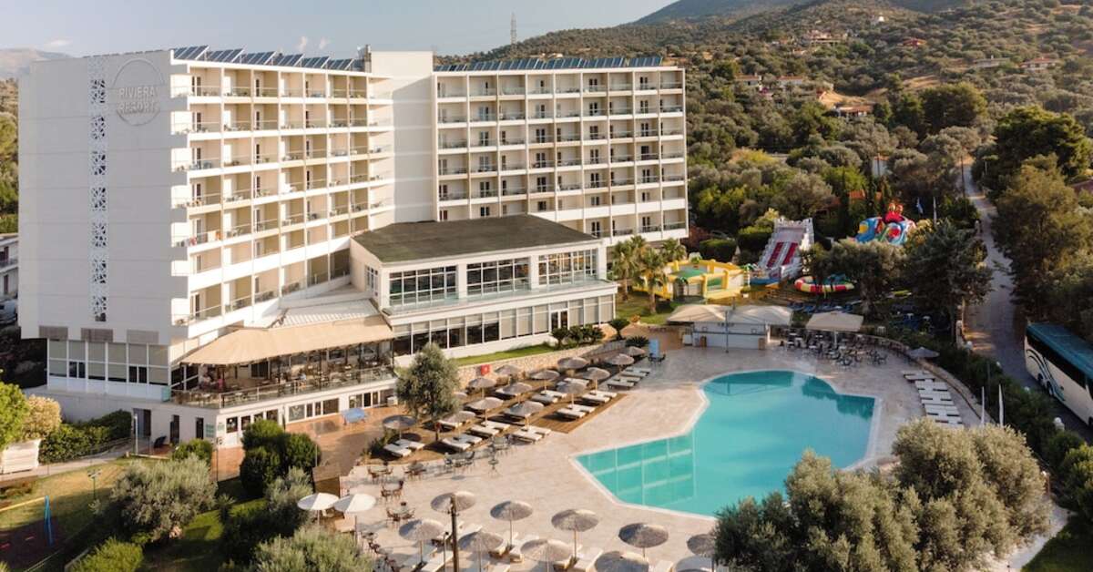 Een foto van het zwembad bij Evia Riviera Resort