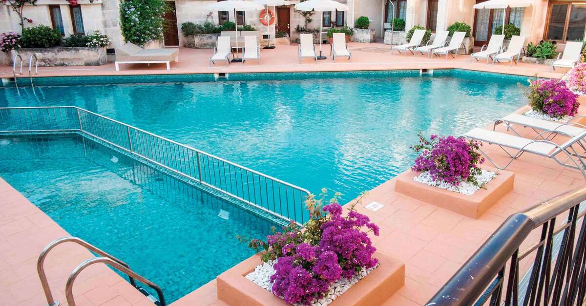 Een foto van het zwembad bij Pierre & Vacances Premium Menorca Binibeca