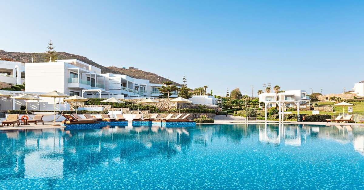 Een foto van het zwembad bij The Royal Blue Resort & Spa