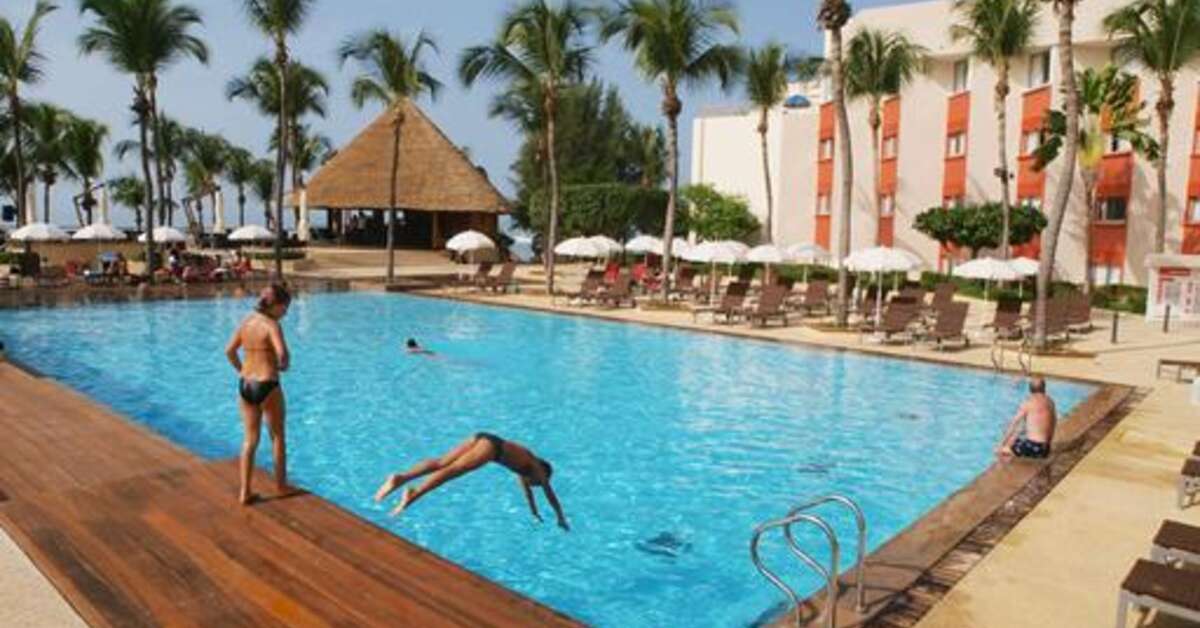 Een foto van het zwembad bij Hotel Palm Beach