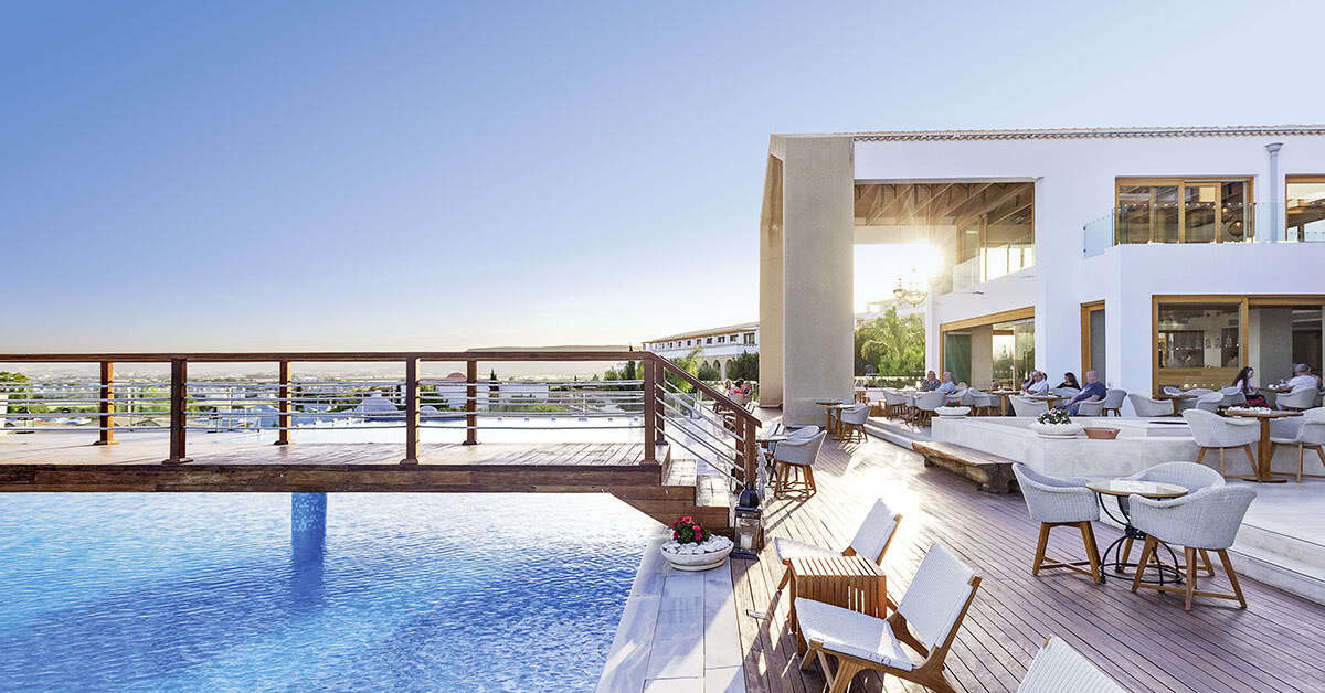 Een foto van het zwembad bij Mitsis Blue Domes Exclusive Resort & Spa