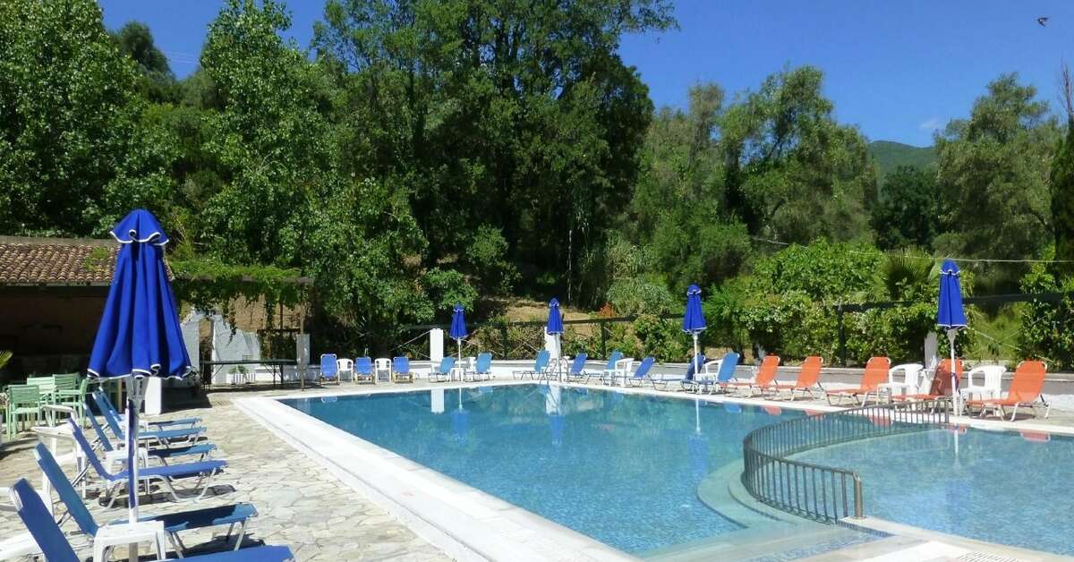 Een foto van het zwembad bij Ipsos Beach Hotel