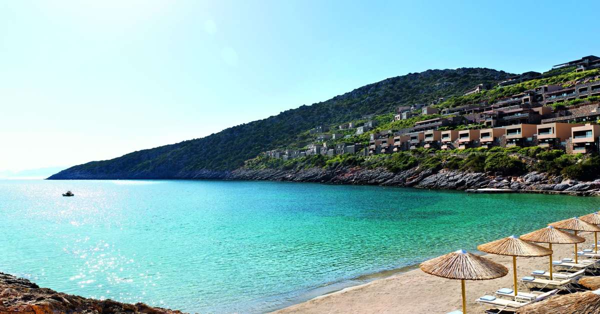 Een foto van het strand bij Daios Cove Luxury Resort & Villas