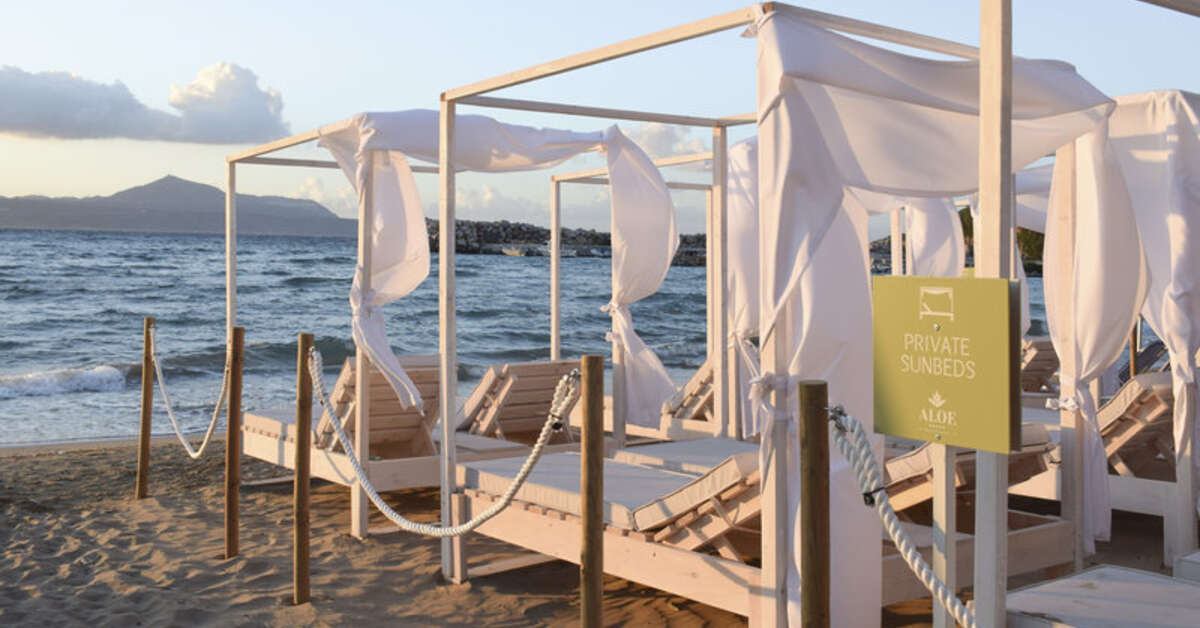 Een foto van het strand bij Aloe Boutique & Suites