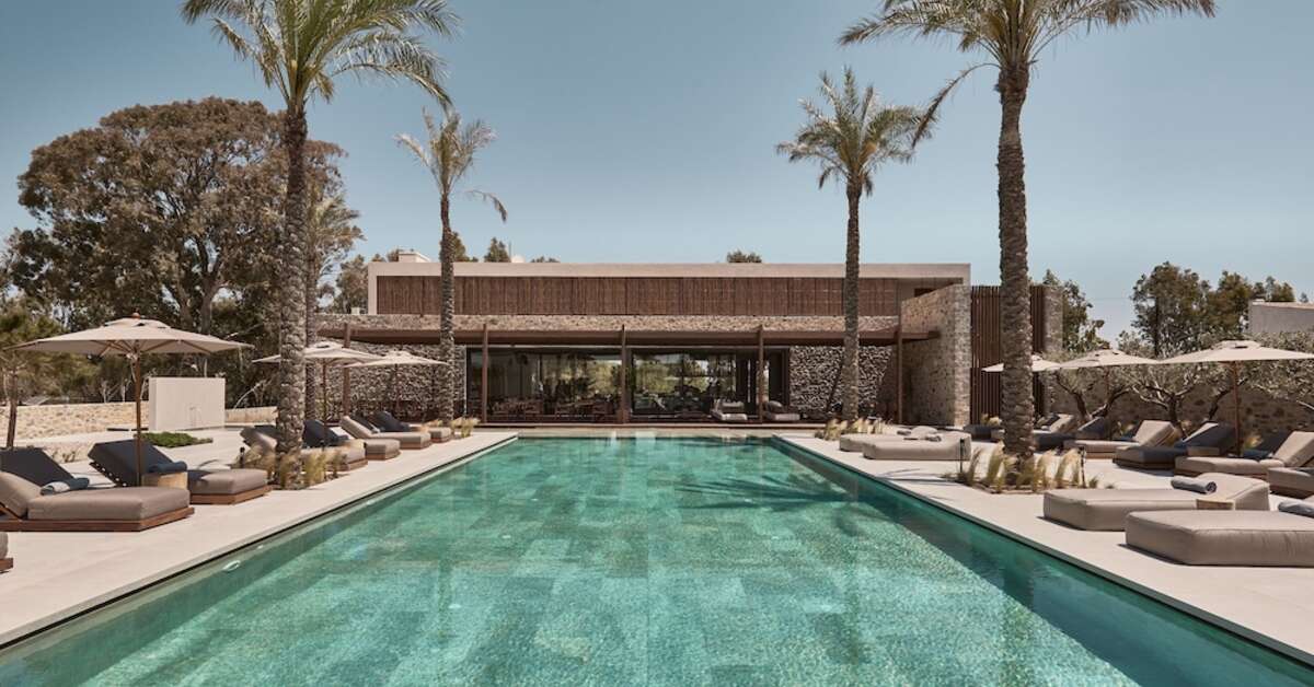 Een foto van het zwembad bij Theros All Suite Hotel
