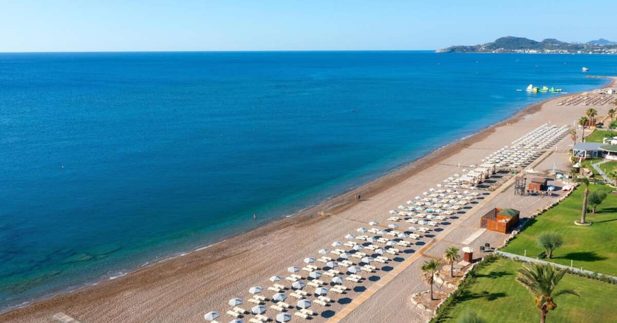 Een foto van het strand bij Rodos Palladium Hotel