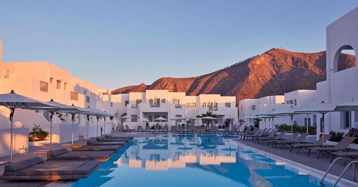 Een foto van het zwembad bij Aqua Blue Hotel