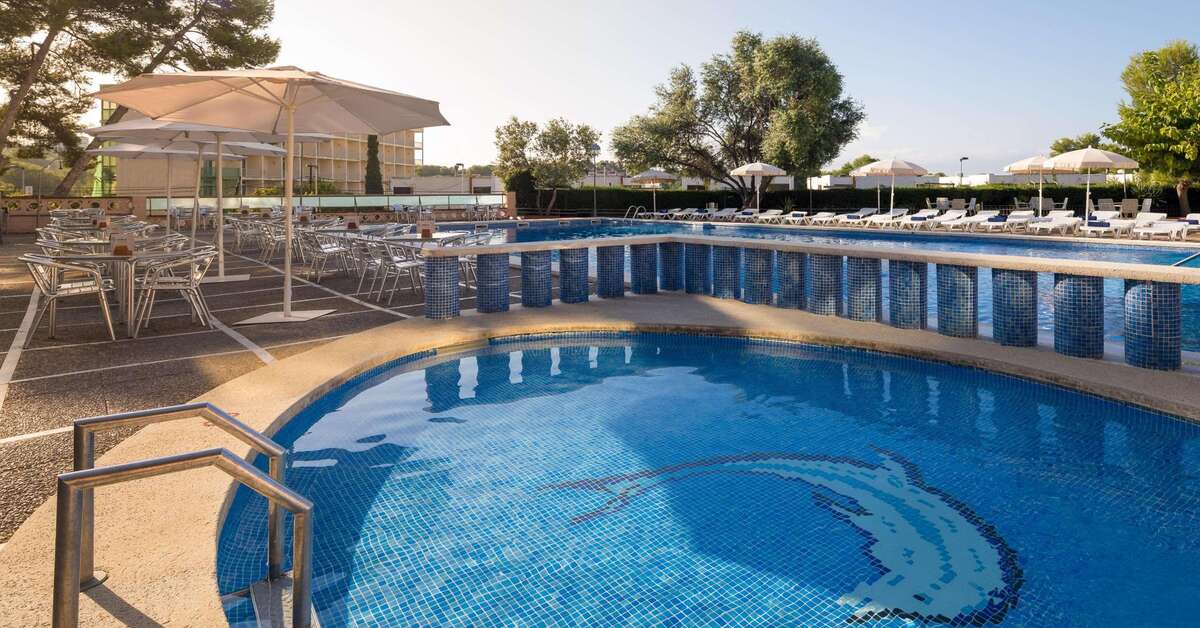 Een foto van het zwembad bij H-Top Molinos Park Hotel