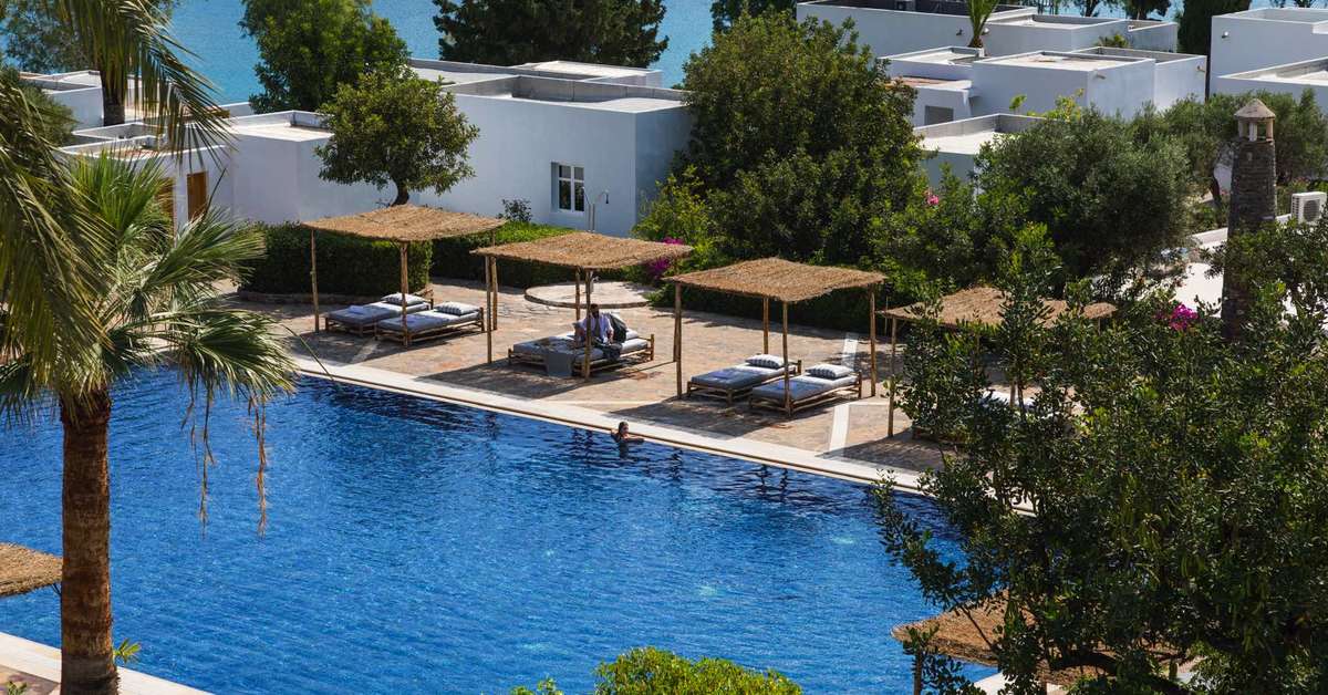 Een foto van het zwembad bij Minos Beach Art Hotel