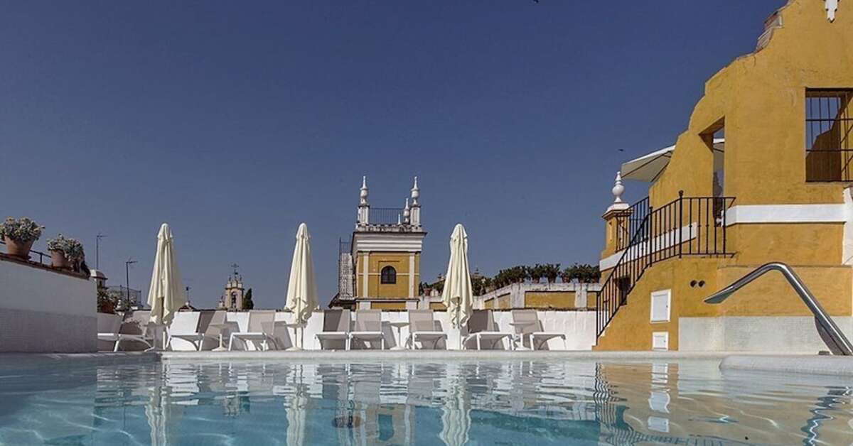 Een foto van het zwembad bij Hotel Las Casas de la Juderia