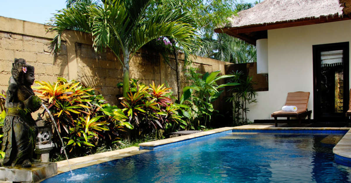 Een foto van het zwembad bij Furama Villas & Spa Ubud