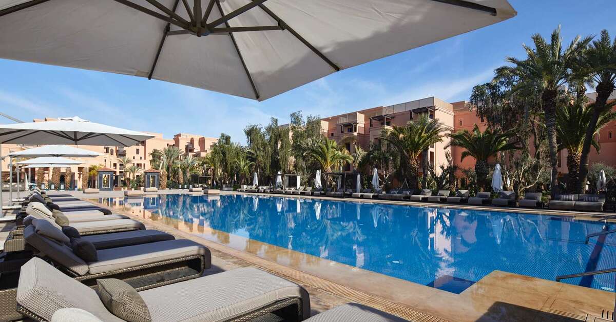 Een foto van het zwembad bij Mövenpick Hotel Mansour Eddahbi Marrakech