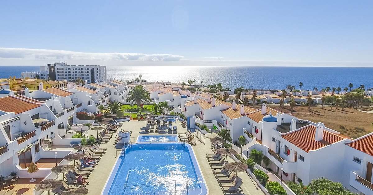Een foto van het zwembad bij Sunset View Club by Diamond Resorts