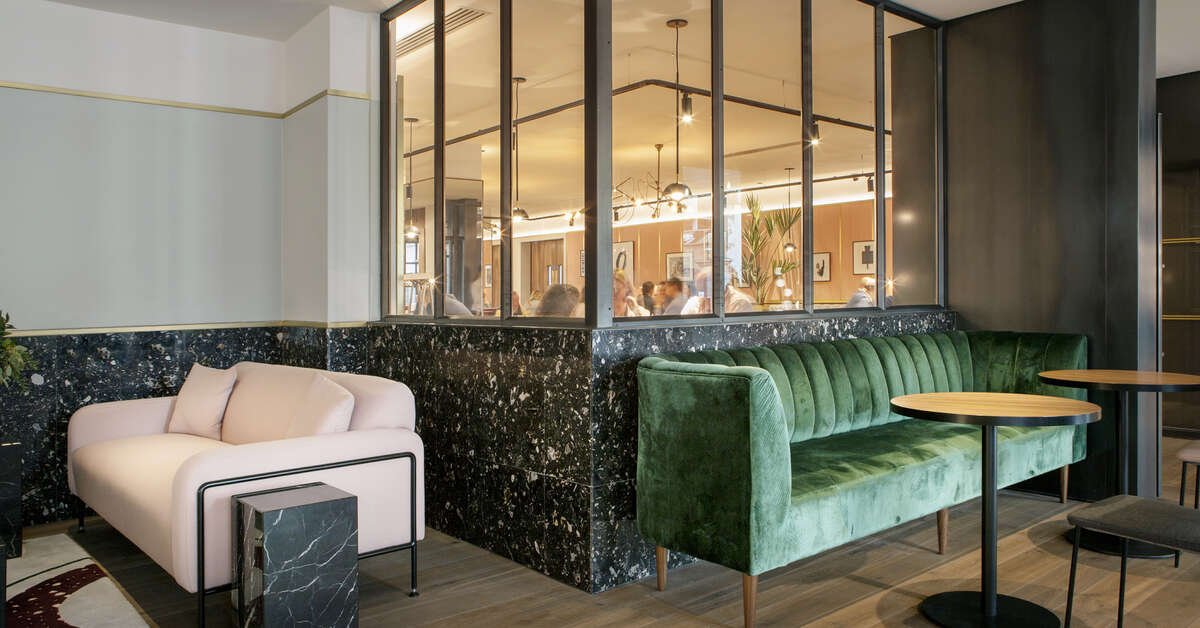 Een foto van het interieur van The Alex