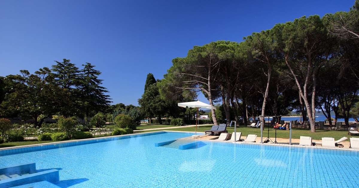 Een foto van het zwembad bij Falkensteiner Hotel Adriana