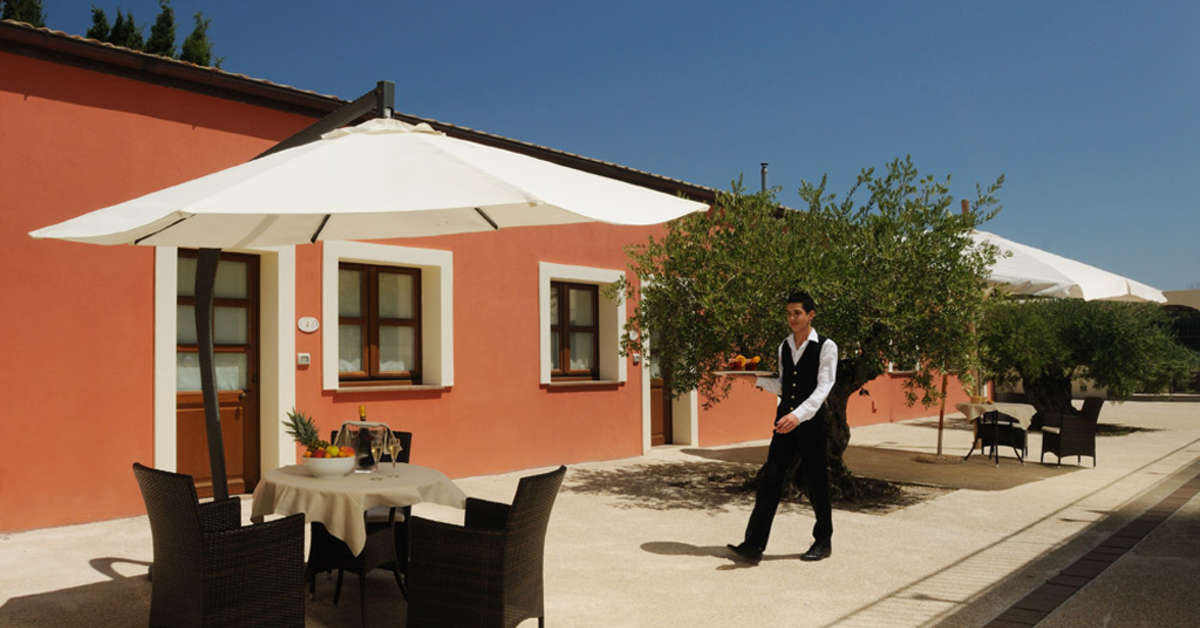 Een foto van het terras bij Alghero Resort Country Hotel