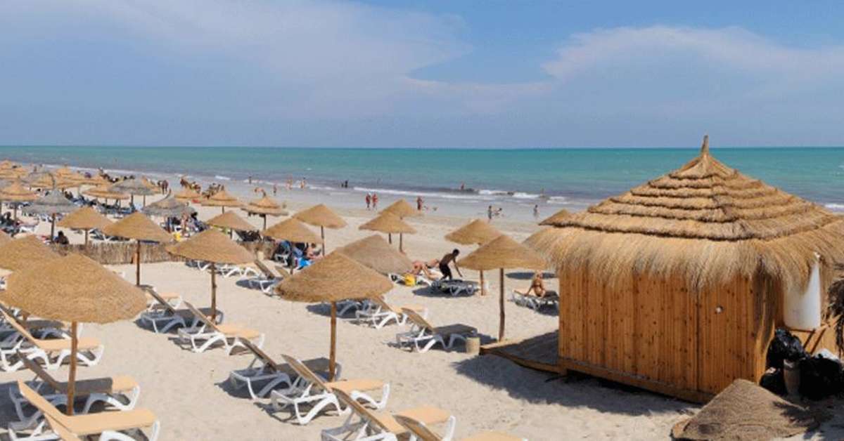 Een foto van het strand bij Jardins de Toumana