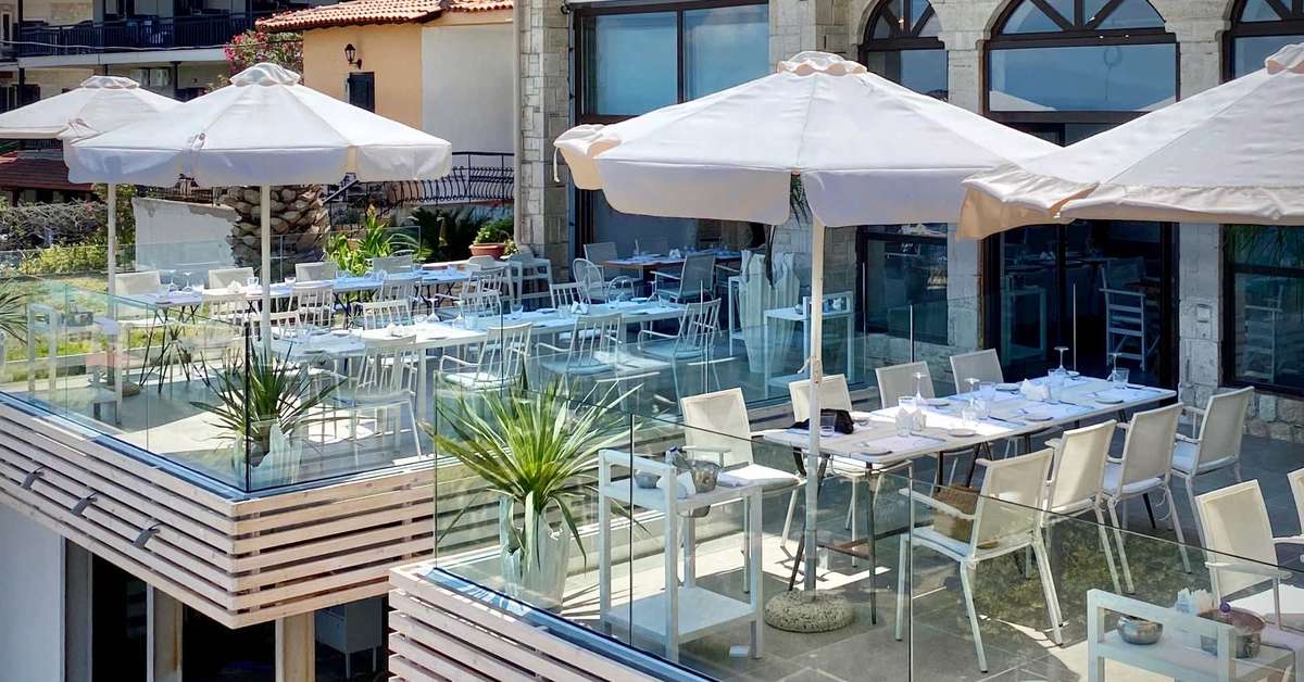 Een foto van het terras bij Rigas Boutique Hotel