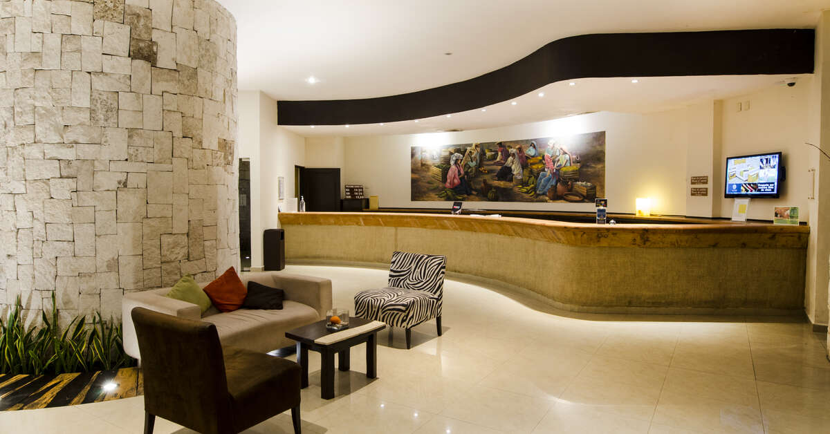 Een foto van het interieur van The Reef Playacar Resort