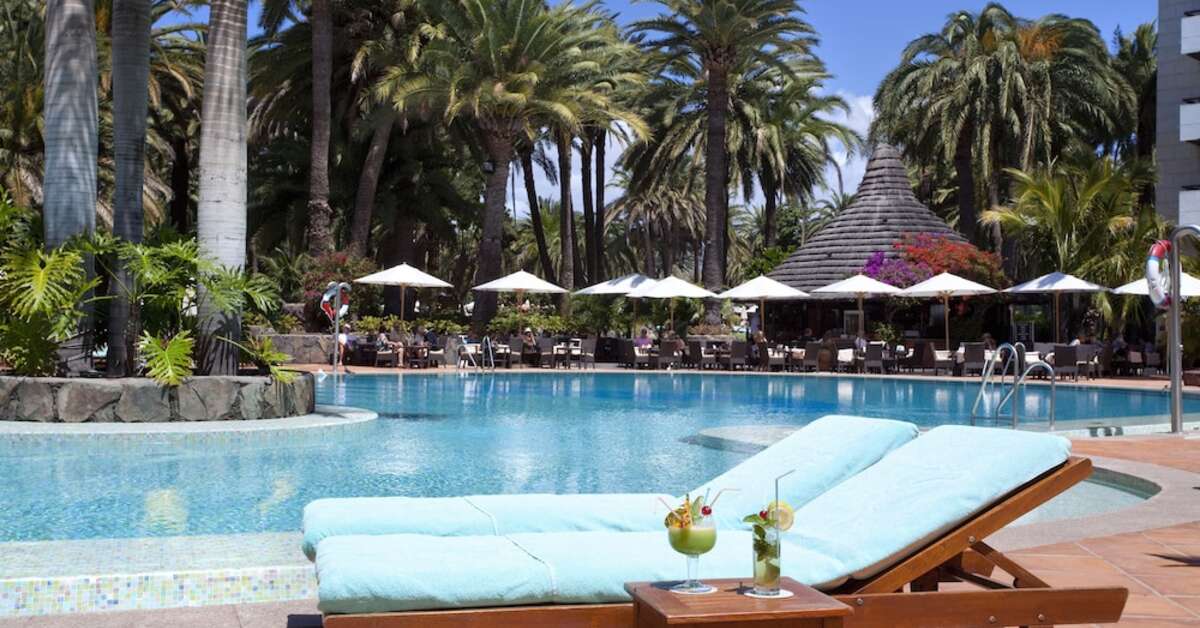 Een foto van het zwembad bij Seaside Palm Beach