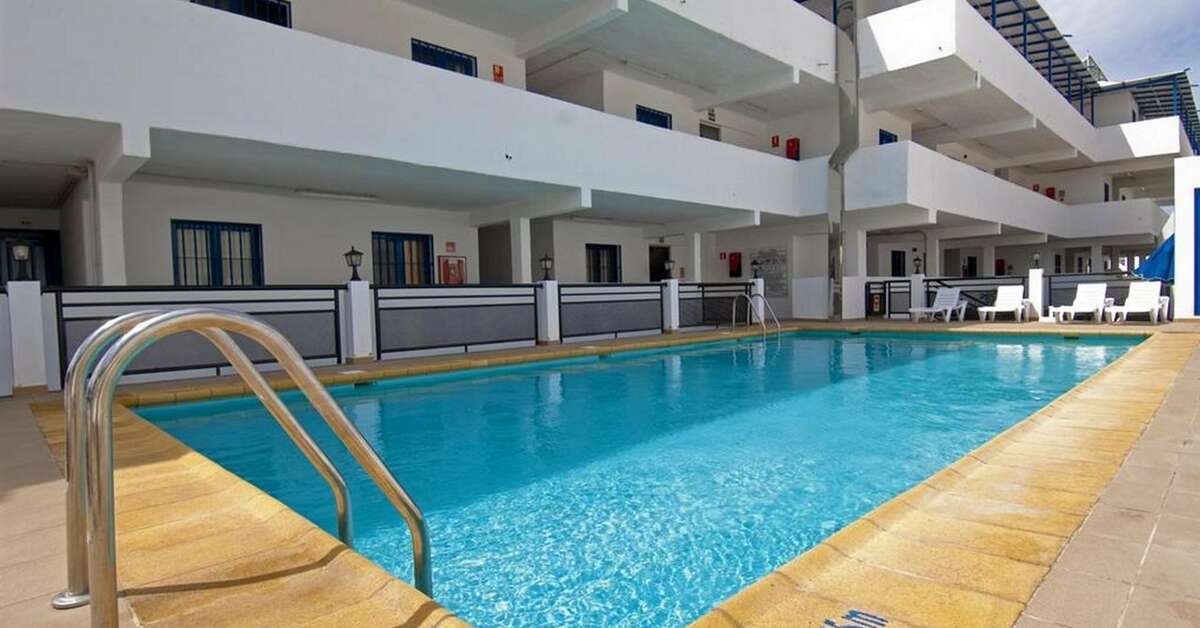 Een foto van het zwembad bij Blue Sea Los Cocoteros Appartementen