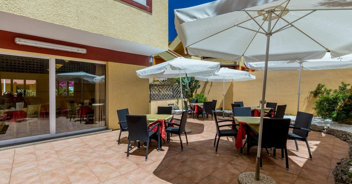 Een foto van het terras bij Hotel Rosa Dei Venti