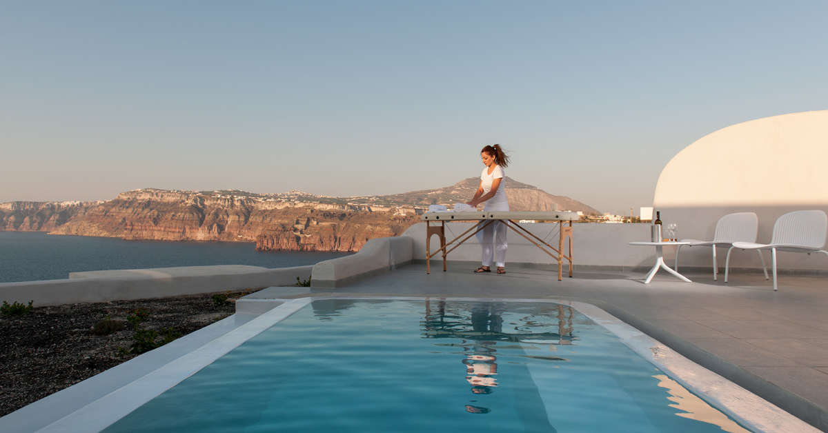 Een foto van het zwembad bij Neptune Luxury Spa Suites