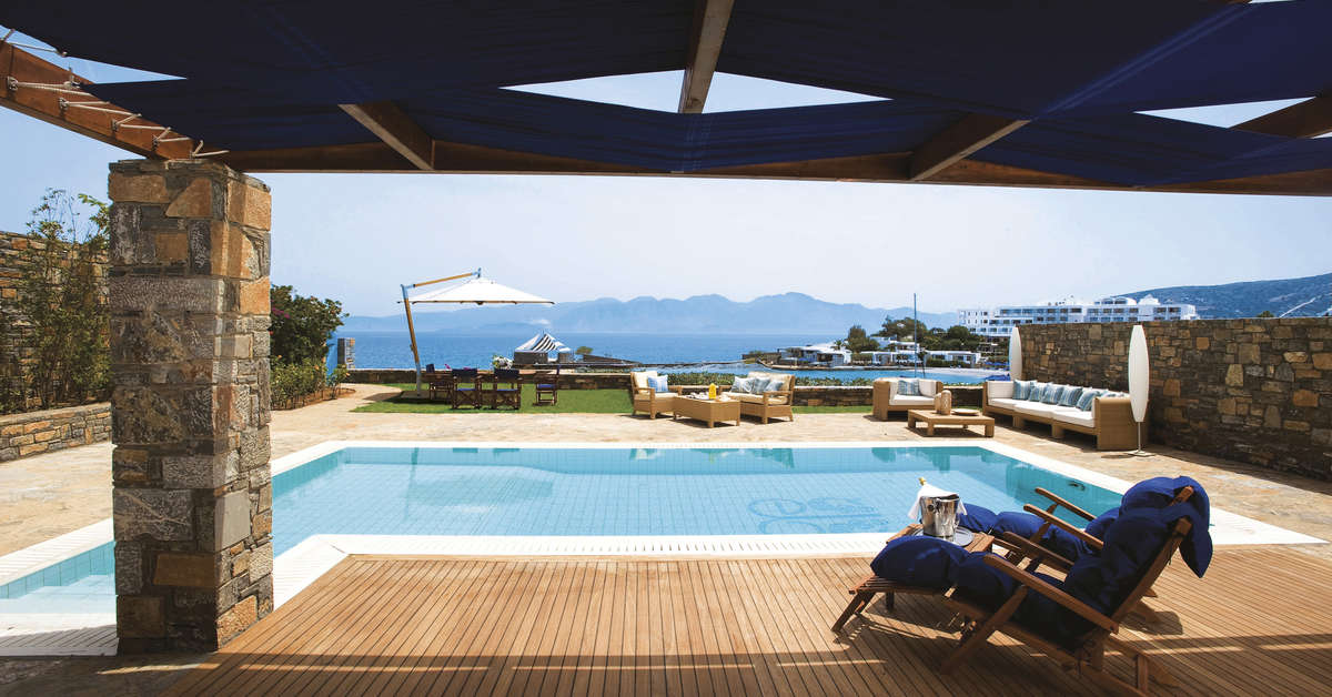 Een foto van het zwembad bij Elounda Beach Hotel & Villas