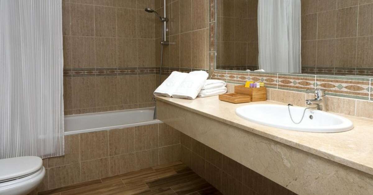 Ein Foto Fergus Style Cala Blanca Suites