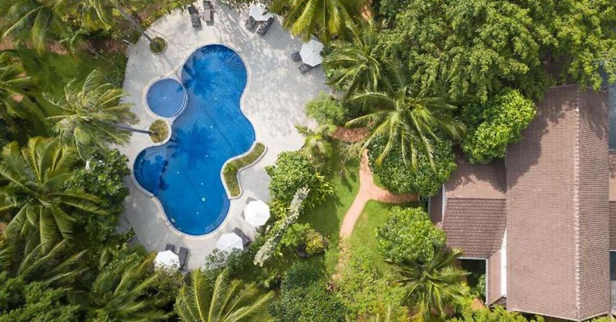 Een foto van het zwembad bij Paradise Beach Resort