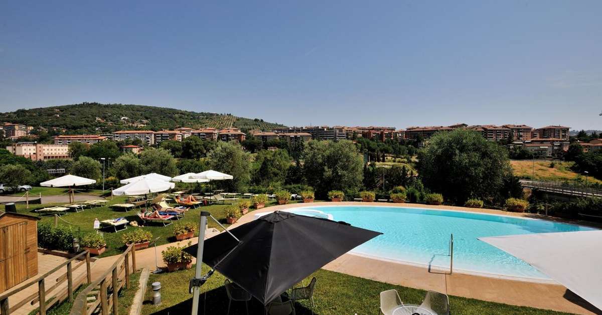 Een foto van het zwembad bij Hotel La Meridiana