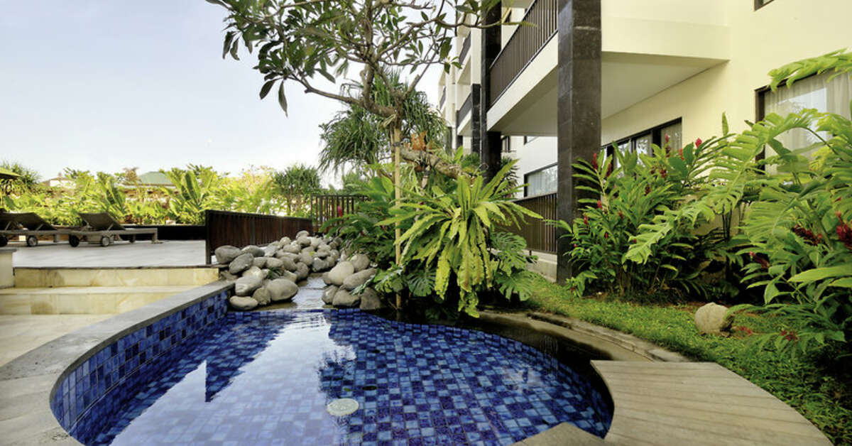 Een foto van het zwembad bij Taksu Sanur Hotel
