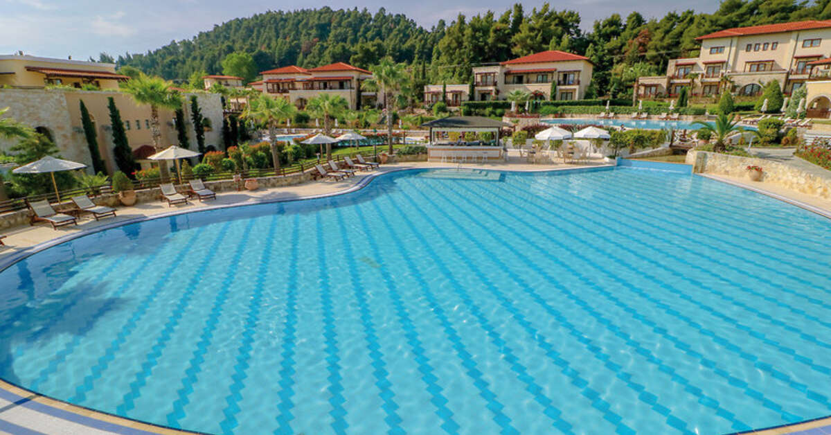 Een foto van het zwembad bij Hotel Aegean Melathron Thalasso & Spa