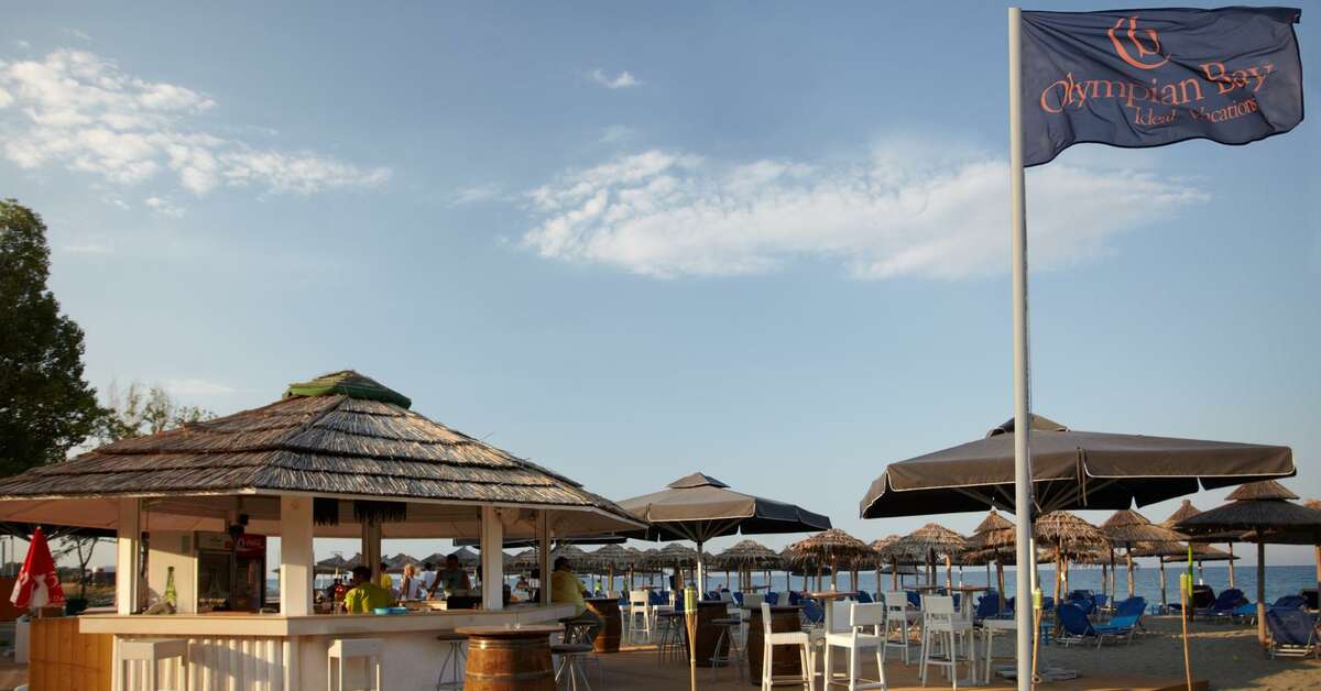 Een foto van het strand bij Olympian Bay Grand Resort