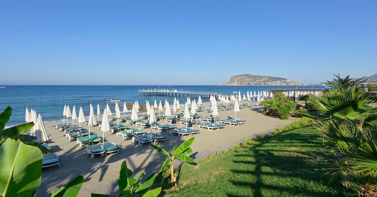 Een foto van het strand bij Antique Roman Palace Museum Hotel