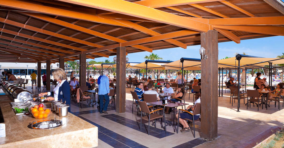 Een foto van het terras bij Venosa Beach Resort & Spa