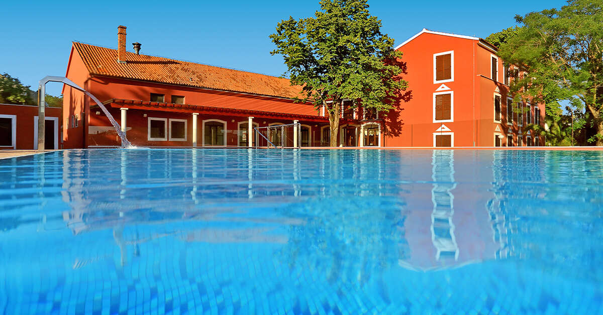 Een foto van het zwembad bij Villa Donat