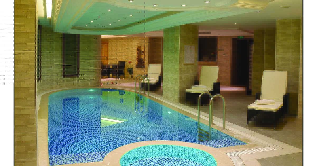 Een foto van het zwembad bij Askoc Hotel