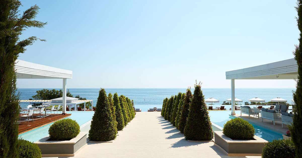 Een foto van het zwembad bij Cavo Olympo Luxury Hotel & Spa