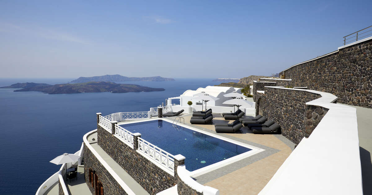 Een foto van het zwembad bij Petit Palace Suites