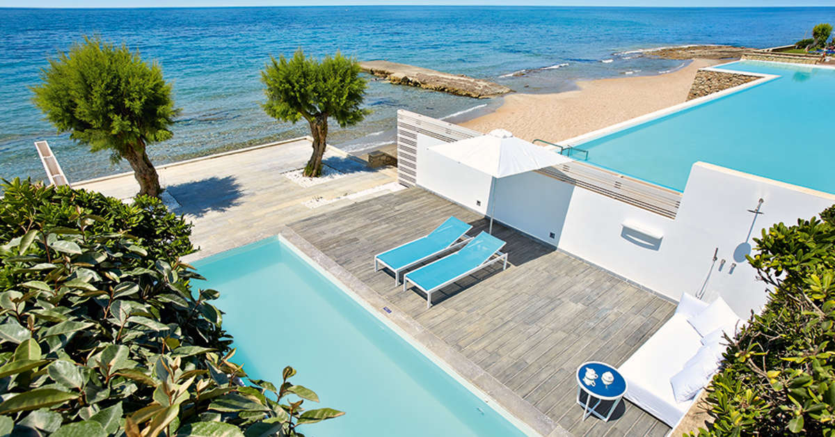 Een foto van het zwembad bij Grecotel Lux Me White Palace