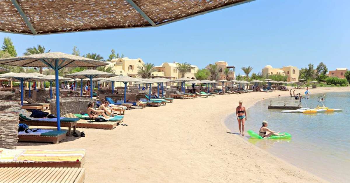 Een foto van het strand bij The Three Corners Rihana Inn