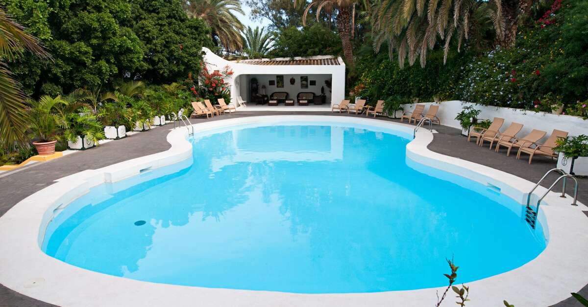 Een foto van het zwembad bij Hotel Rural Cortijo San Ignacio Golf