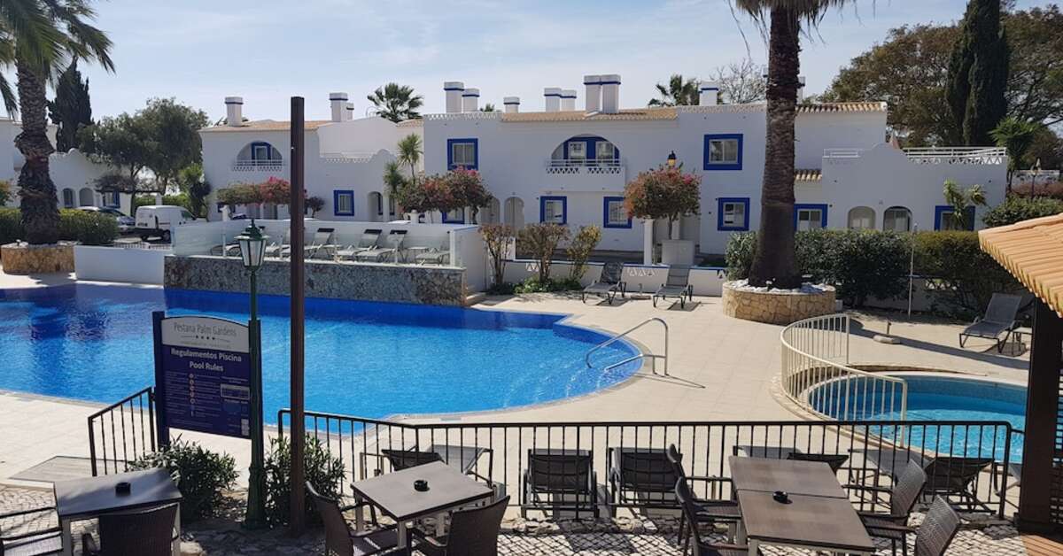 Een foto van het zwembad bij Pestana Palm Gardens