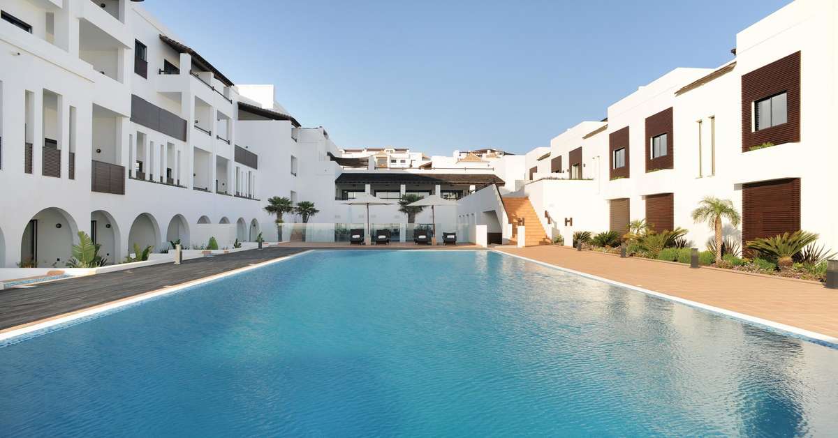 Een foto van het zwembad bij Belmar Spa & Beach Resort