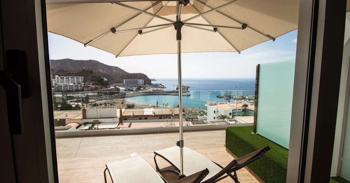Een foto van het terras bij IG Nachosol Premium Appartementen